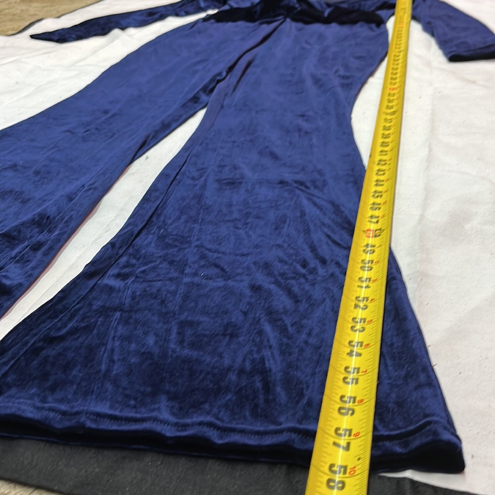 NWOT Royal blue velvet jumpsuit with deep v neckline